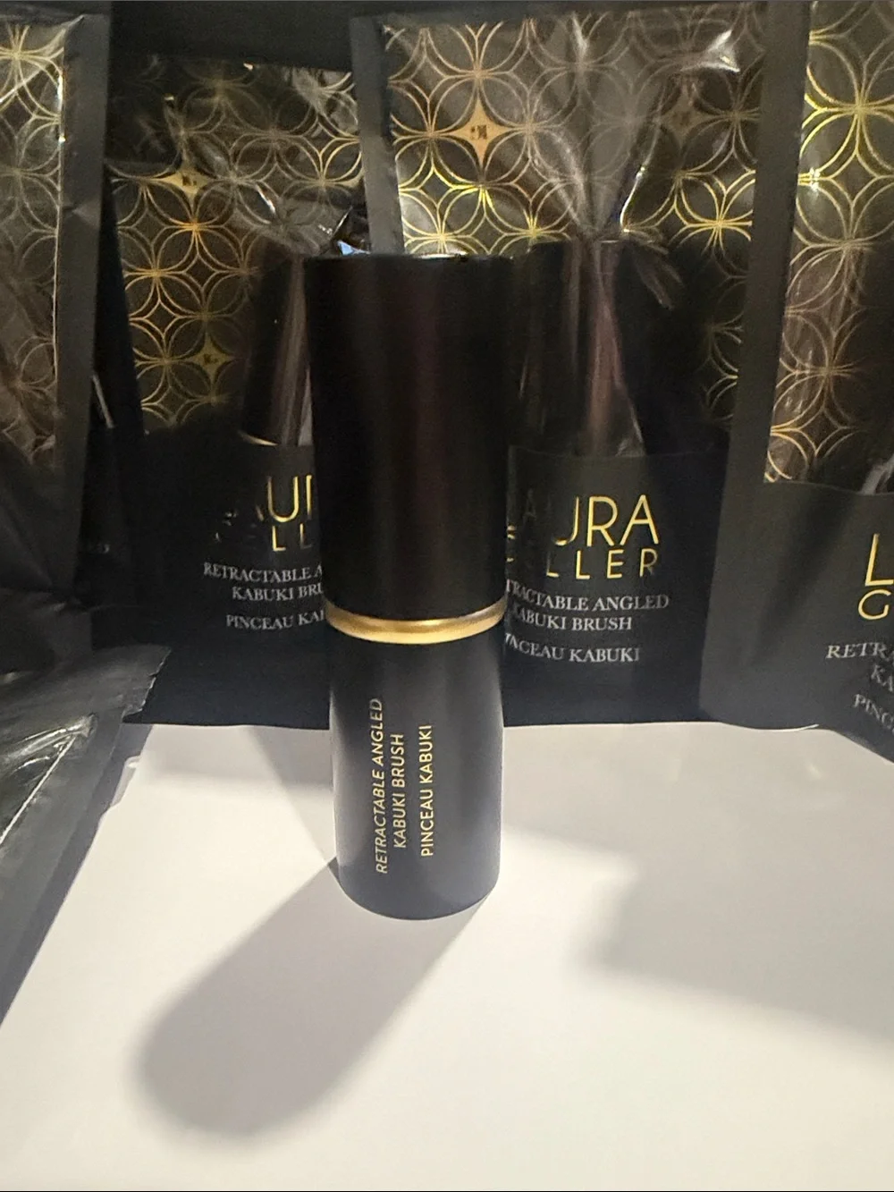 Laura Geller Black and Gold Retractable Angled Kabuki Brush brand new